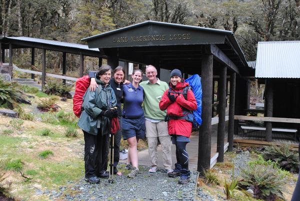 Margaret Mackenzie-Hooson (L) with her fellow travellers and guide at Lake Mackenzie Lodge on the Routeburn Track.